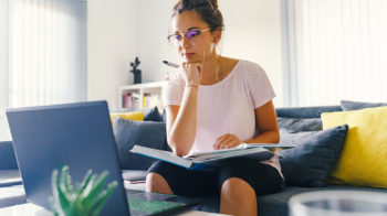 Image of a woman participating in an online learning programme.